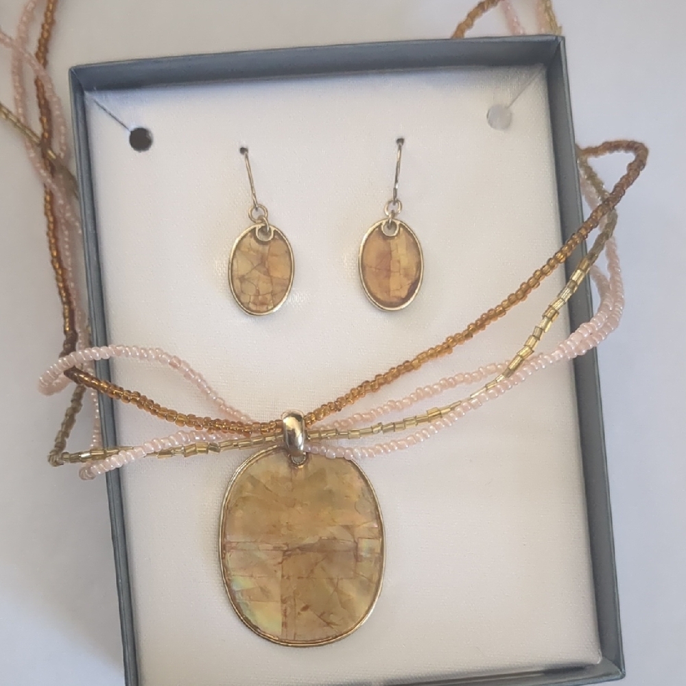 Gold and Cream Necklace with Textured Pendant